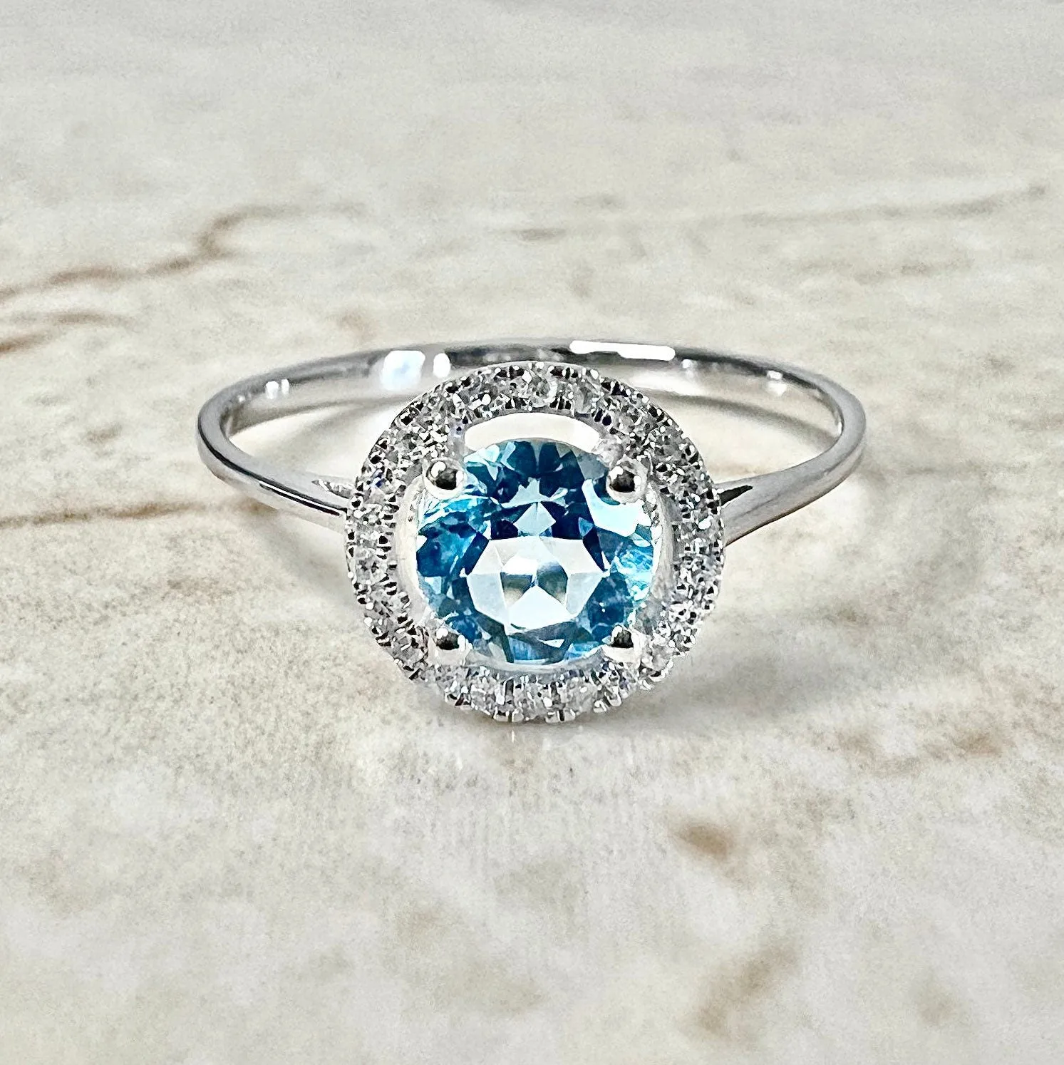 14 Karat White Gold December Birthstone Round Blue Topaz & Diamond Halo Ring