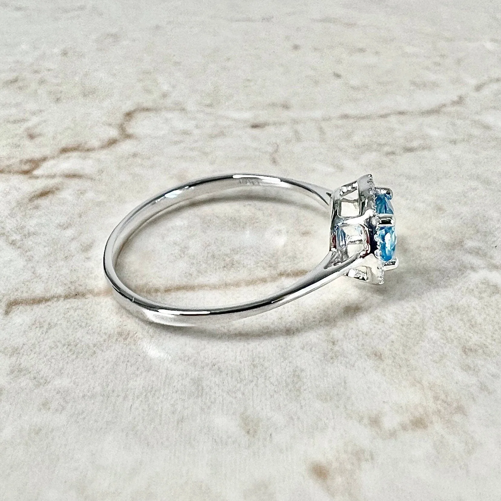 14 Karat White Gold December Birthstone Round Blue Topaz & Diamond Halo Ring