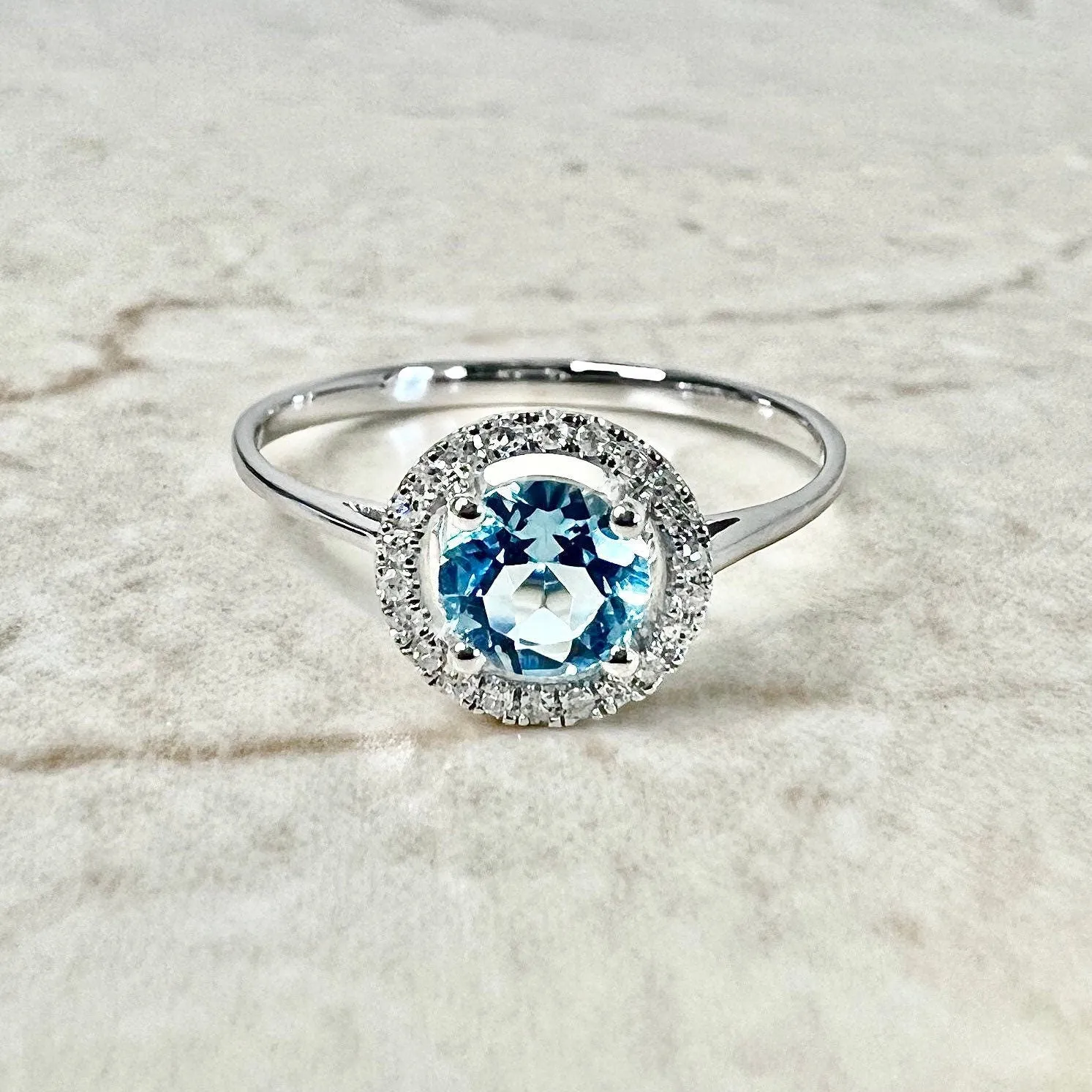 14 Karat White Gold December Birthstone Round Blue Topaz & Diamond Halo Ring