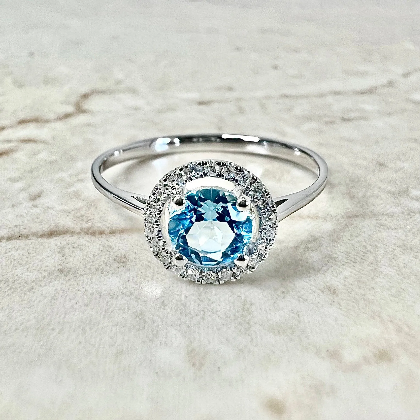 14 Karat White Gold December Birthstone Round Blue Topaz & Diamond Halo Ring