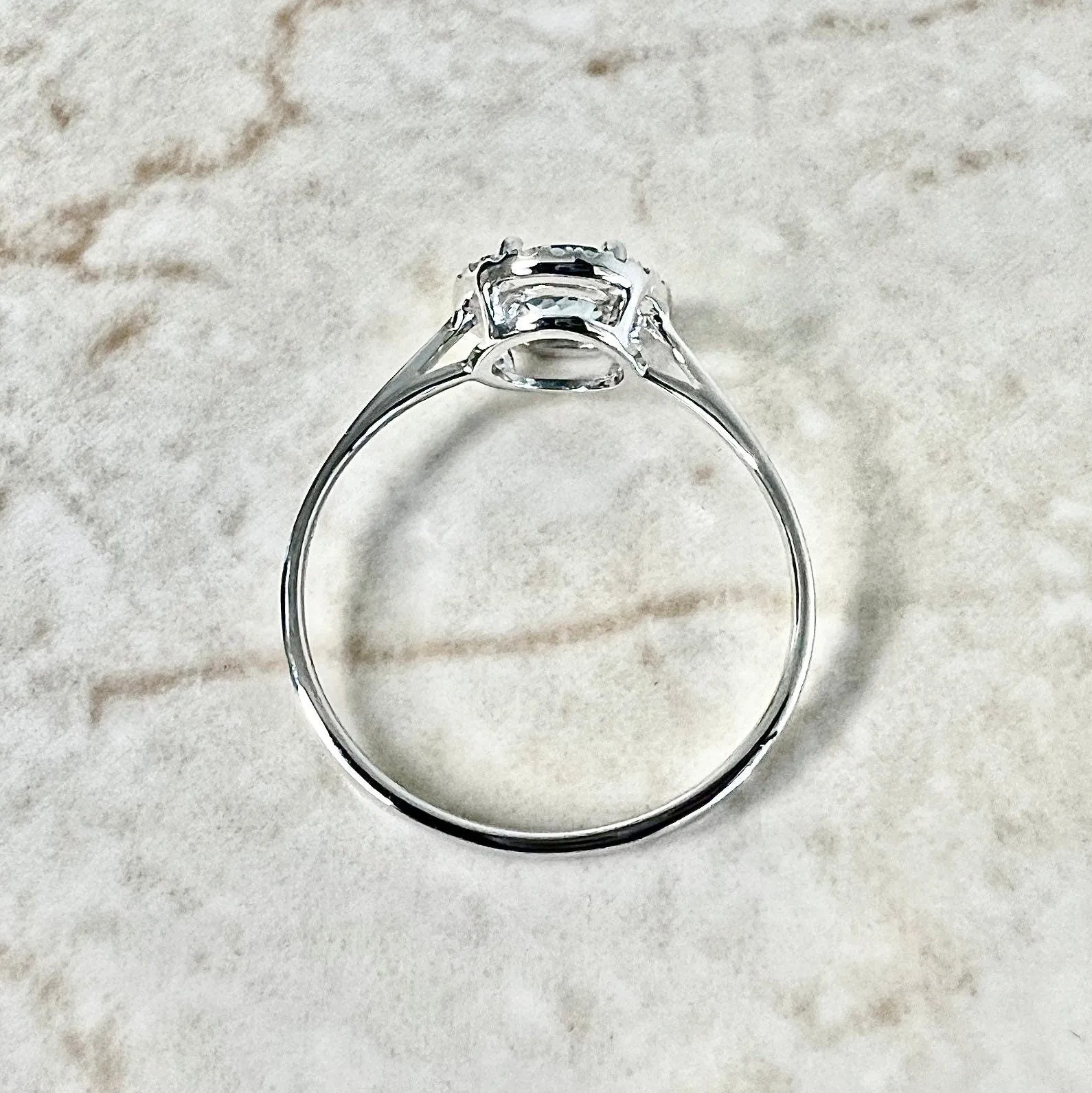 14 Karat White Gold December Birthstone Round Blue Topaz & Diamond Halo Ring