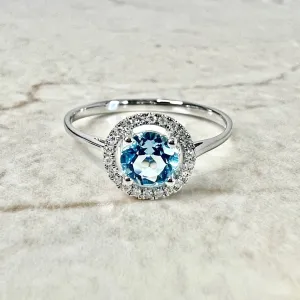 14 Karat White Gold December Birthstone Round Blue Topaz & Diamond Halo Ring