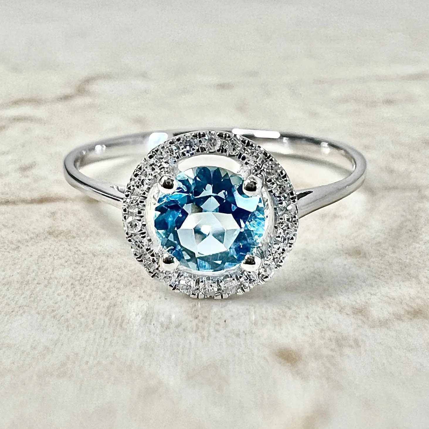 14 Karat White Gold December Birthstone Round Blue Topaz & Diamond Halo Ring
