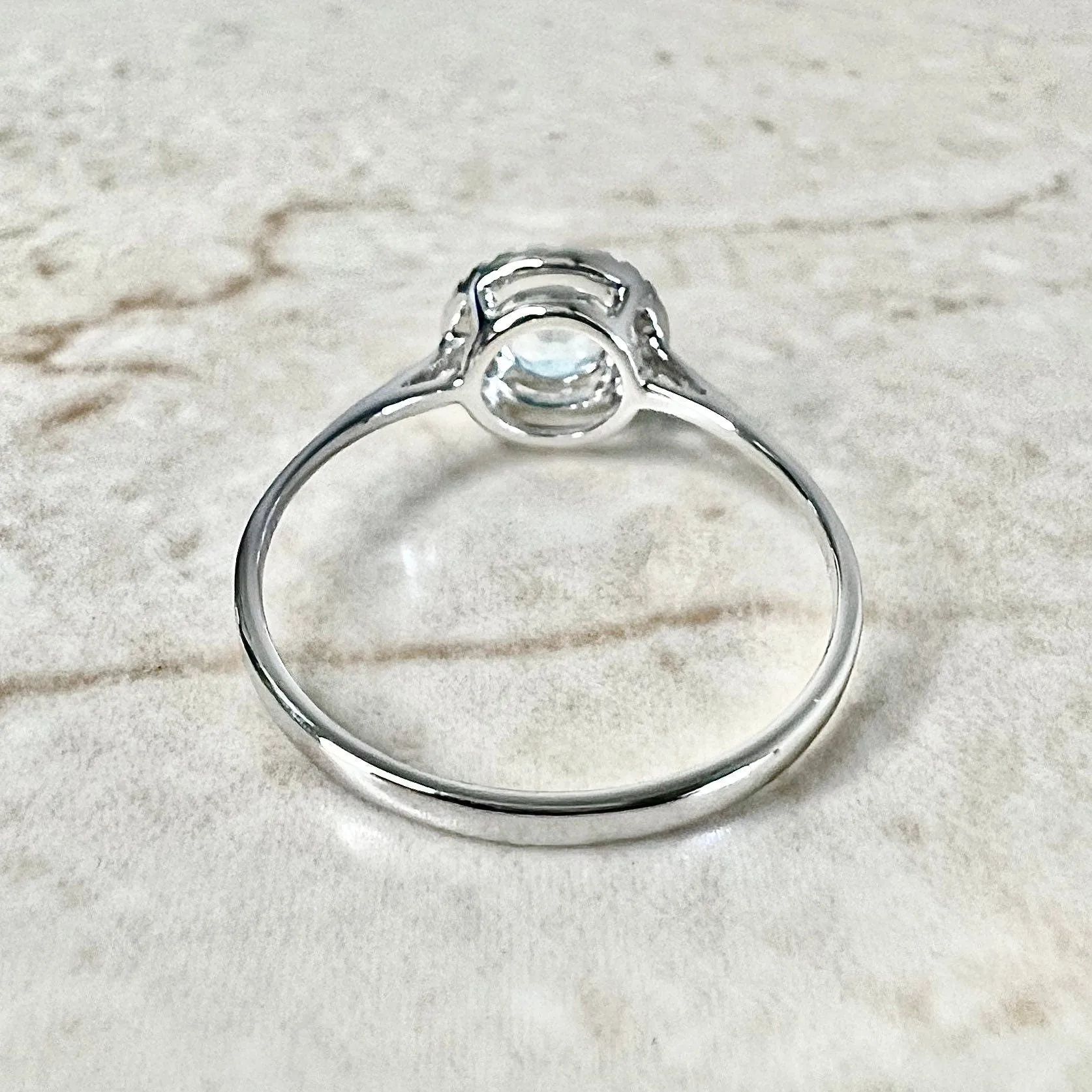 14 Karat White Gold December Birthstone Round Blue Topaz & Diamond Halo Ring