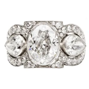 Art Deco Inspired Three Stone Diamond Ring with Oval and Pear Shapes