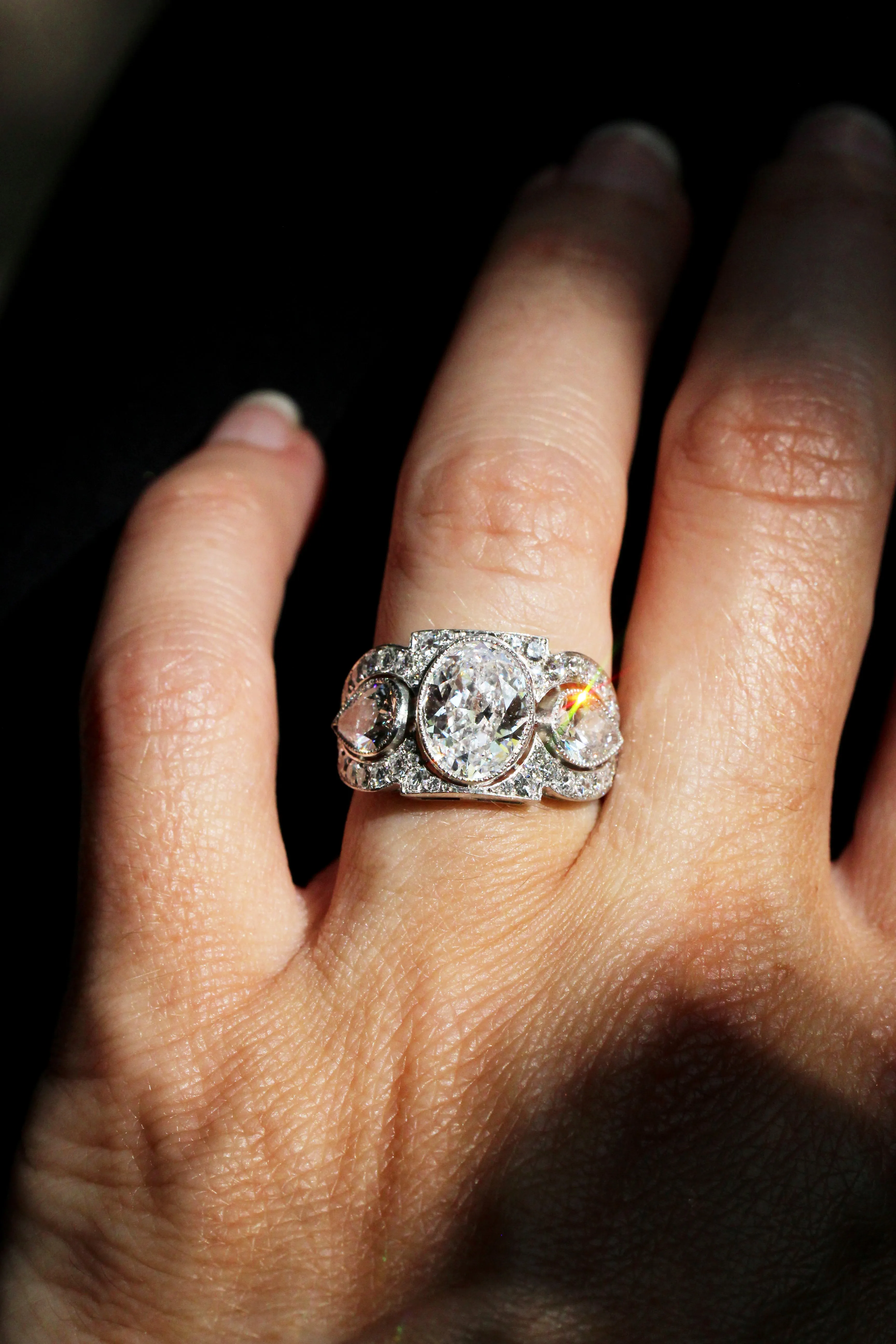 Art Deco Inspired Three Stone Diamond Ring with Oval and Pear Shapes