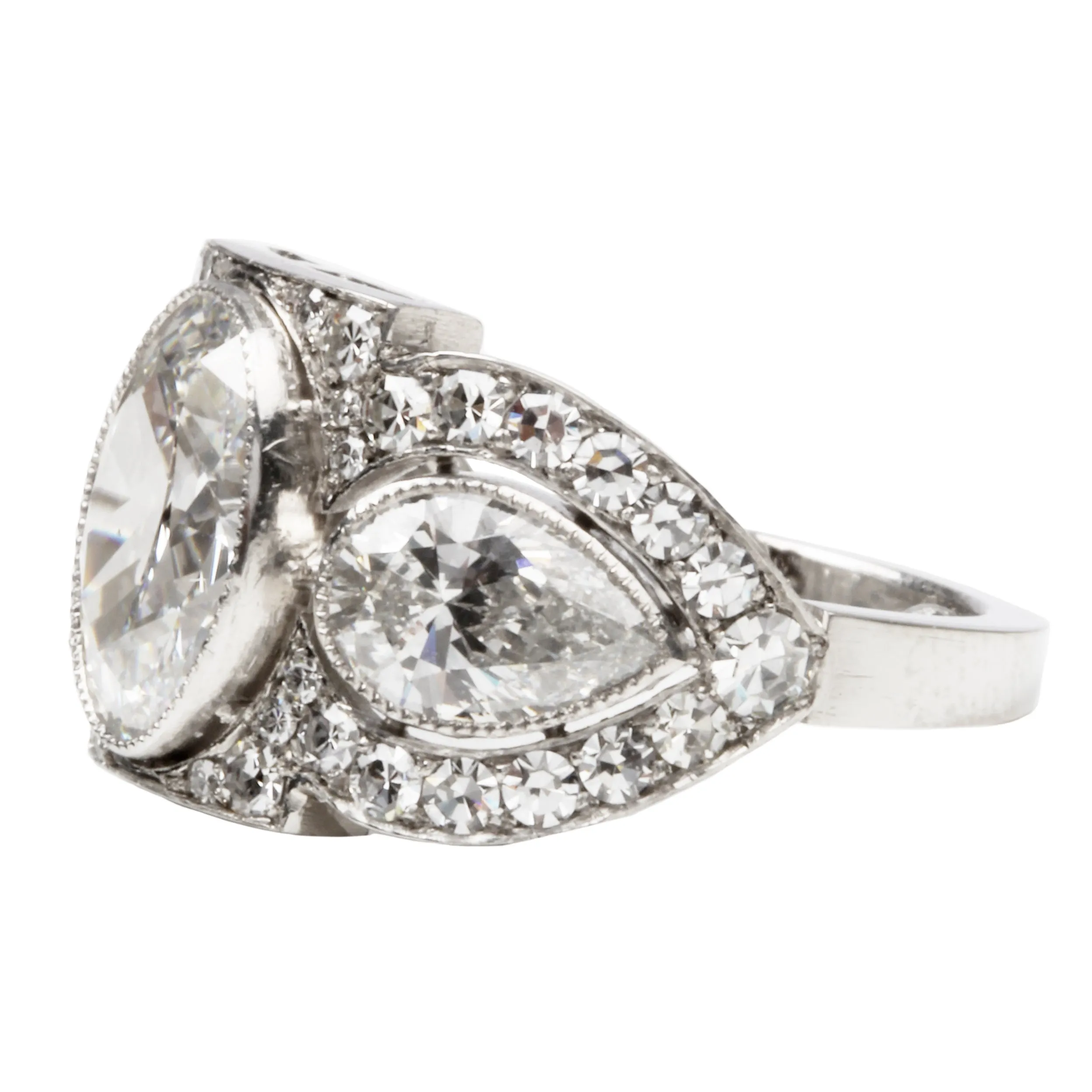 Art Deco Inspired Three Stone Diamond Ring with Oval and Pear Shapes