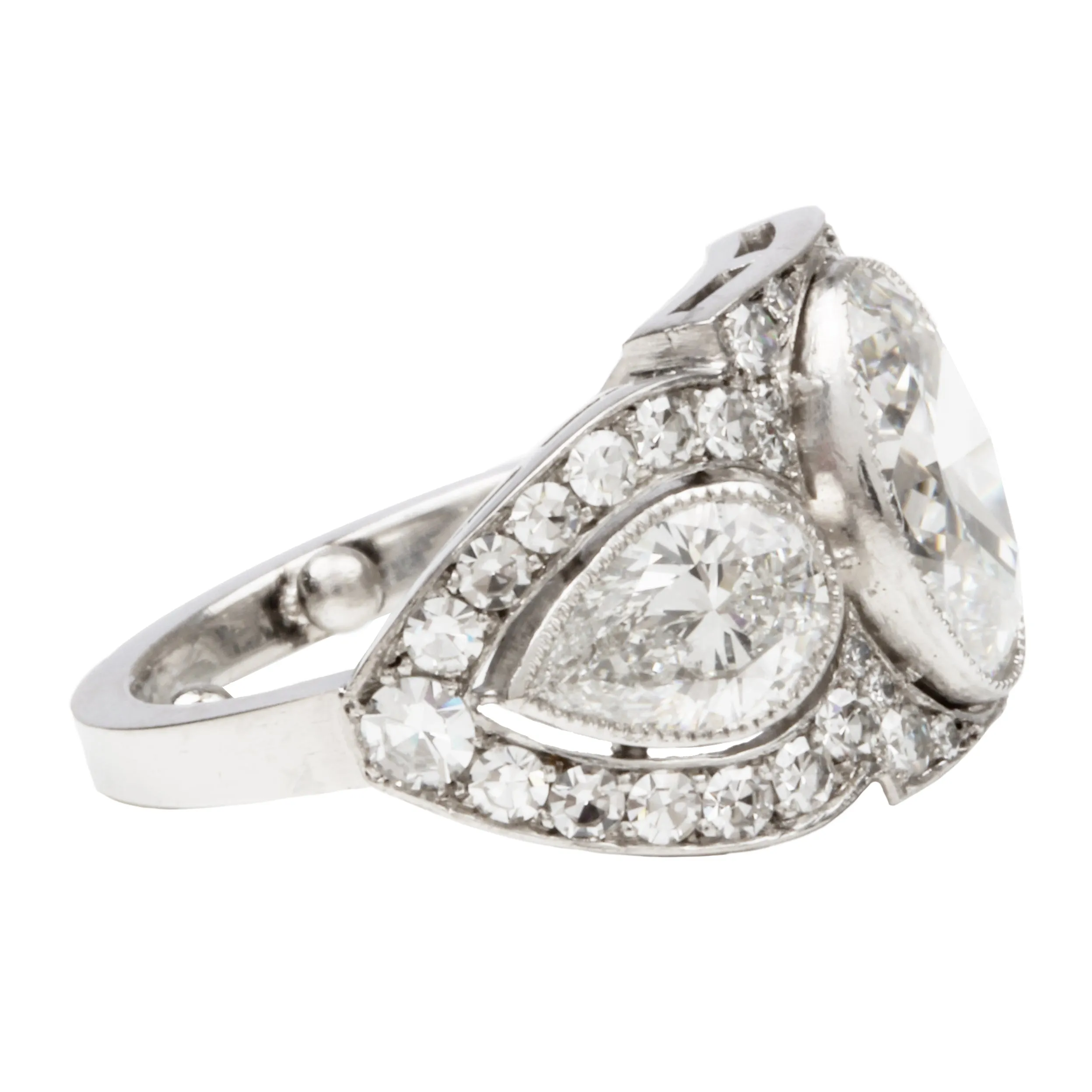 Art Deco Inspired Three Stone Diamond Ring with Oval and Pear Shapes