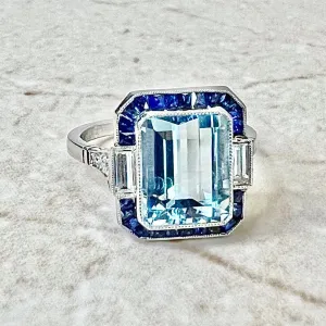 Art Deco Style Handcrafted Platinum 3.23 Carats Aquamarine, Sapphire & Diamond Halo Ring