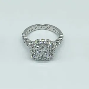 CA 18 Karat White Gold Brilliant Radiant Cut and Diamond Halo Engagement Ring