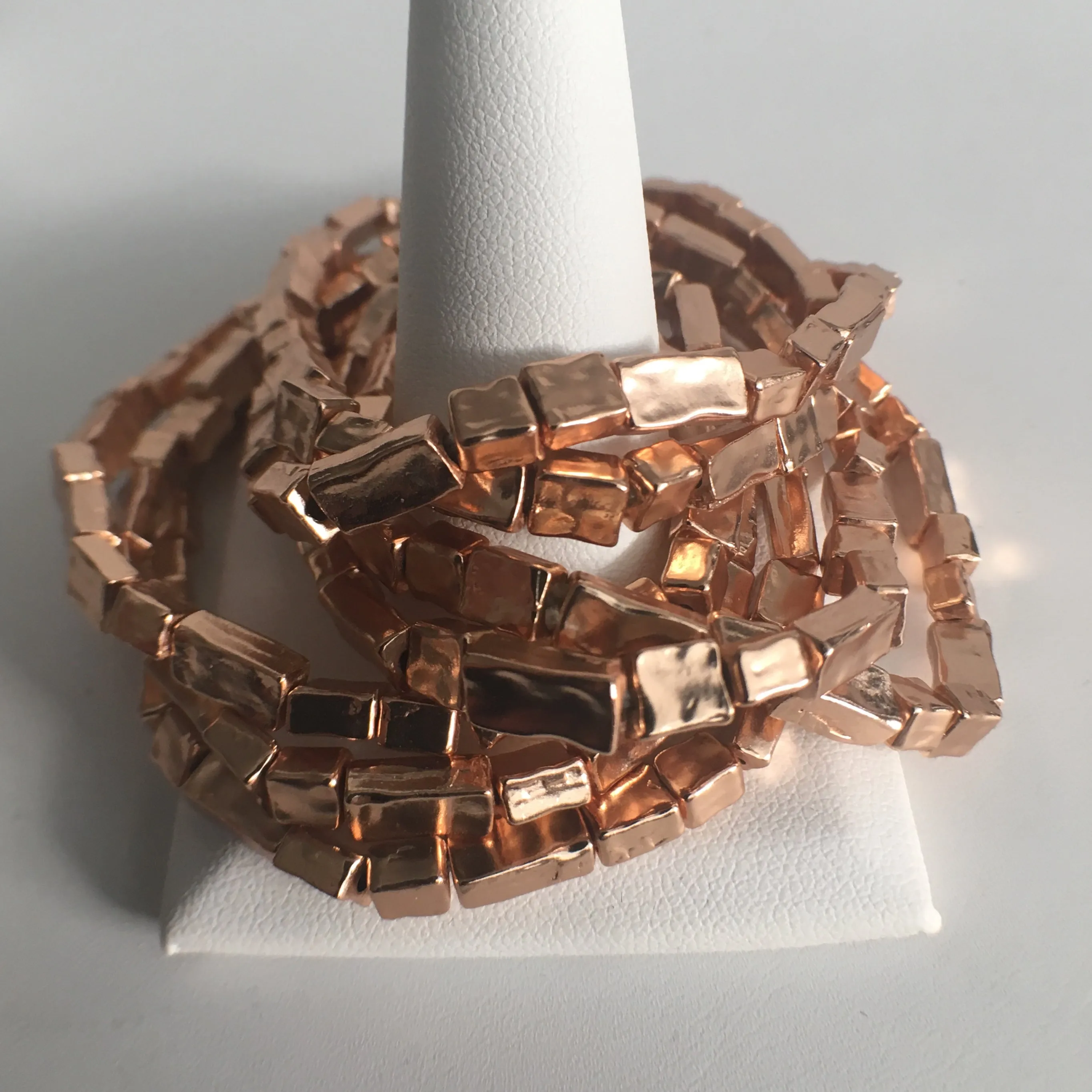 Cluster of Rose Gold Plated Stretch Bracelets