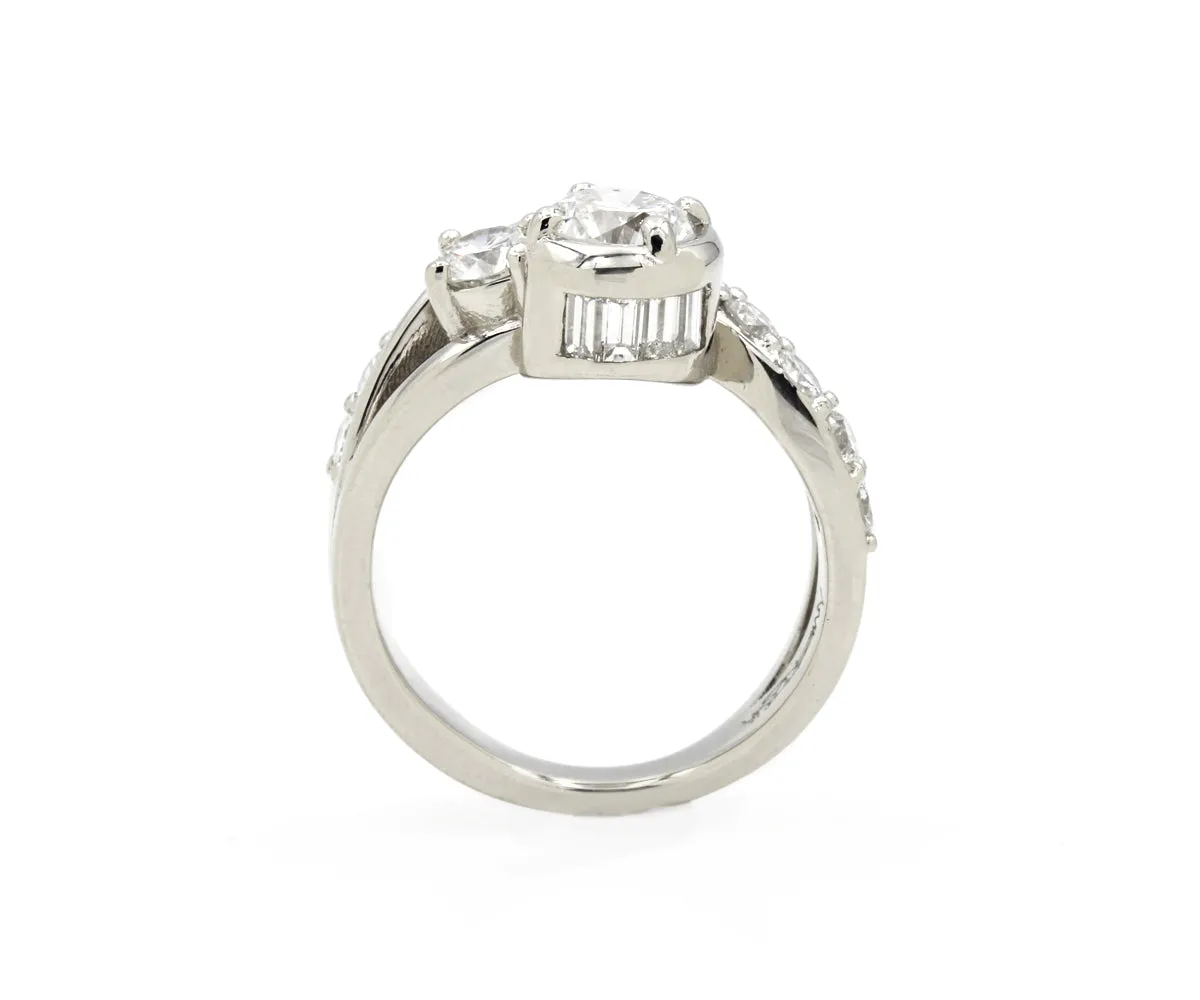 Curved Swirl Round Diamond and Baguette Ring