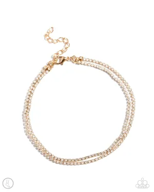 Dainty Declaration - Gold - White Rhinestone Paparazzi Anklet