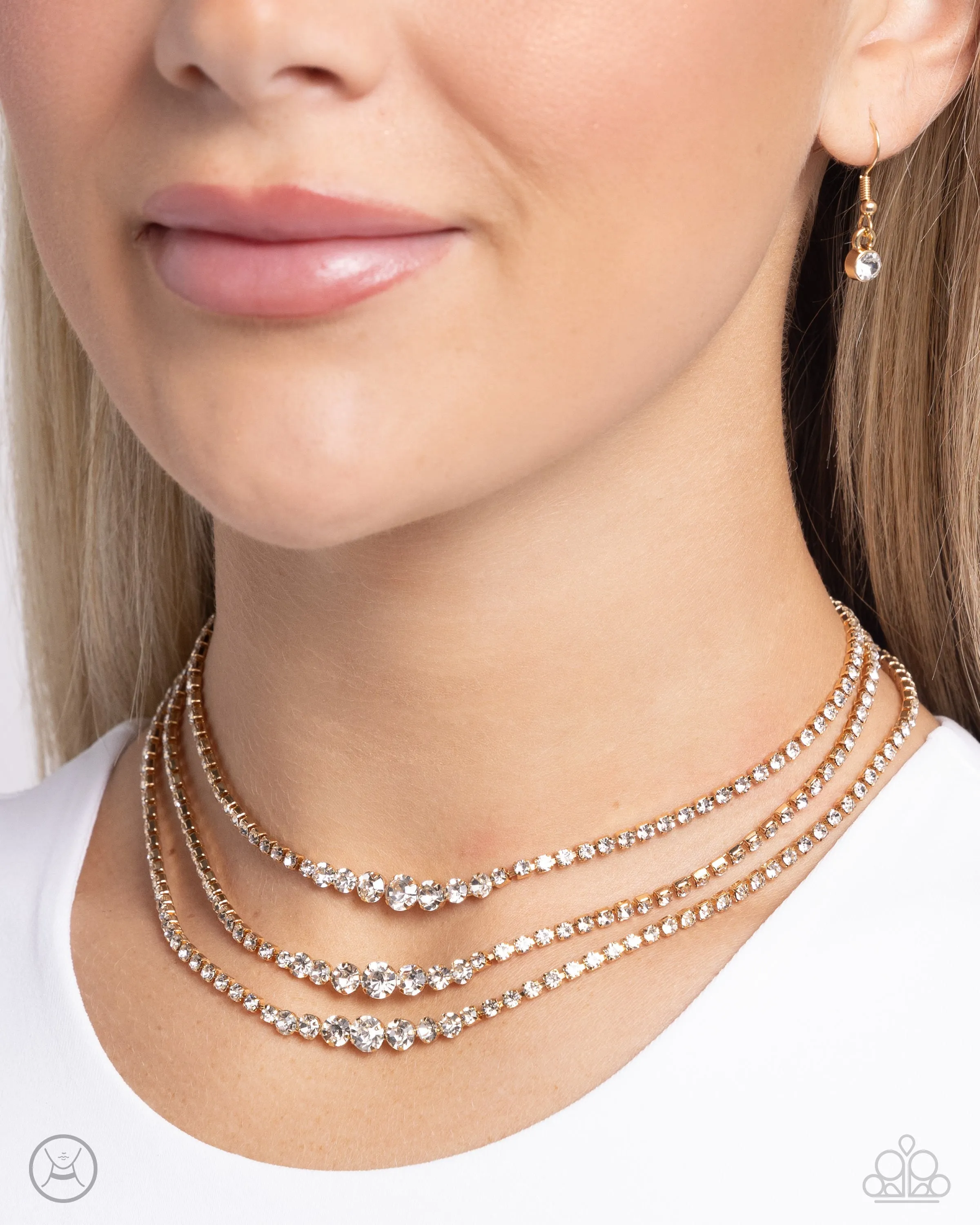 Dynamite Debut - Gold - White Rhinestone Tiered Paparazzi Choker Necklace