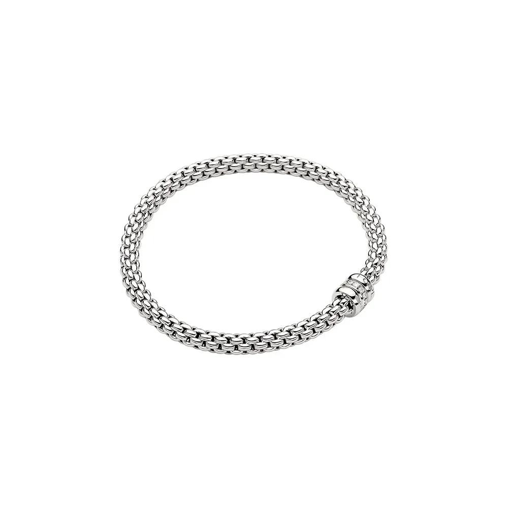 FOPE GIOIELLI 18K WHITE GOLD FLEX'IT BRACELET WITH ONE DIAMOND (VS/F) RONDEL MEASURING 0.10 TOTAL CARAT WEIGHT SIZE LARGE