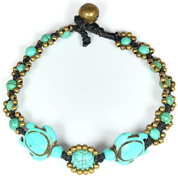 Handmade macramé bracelet with carved stone turtles