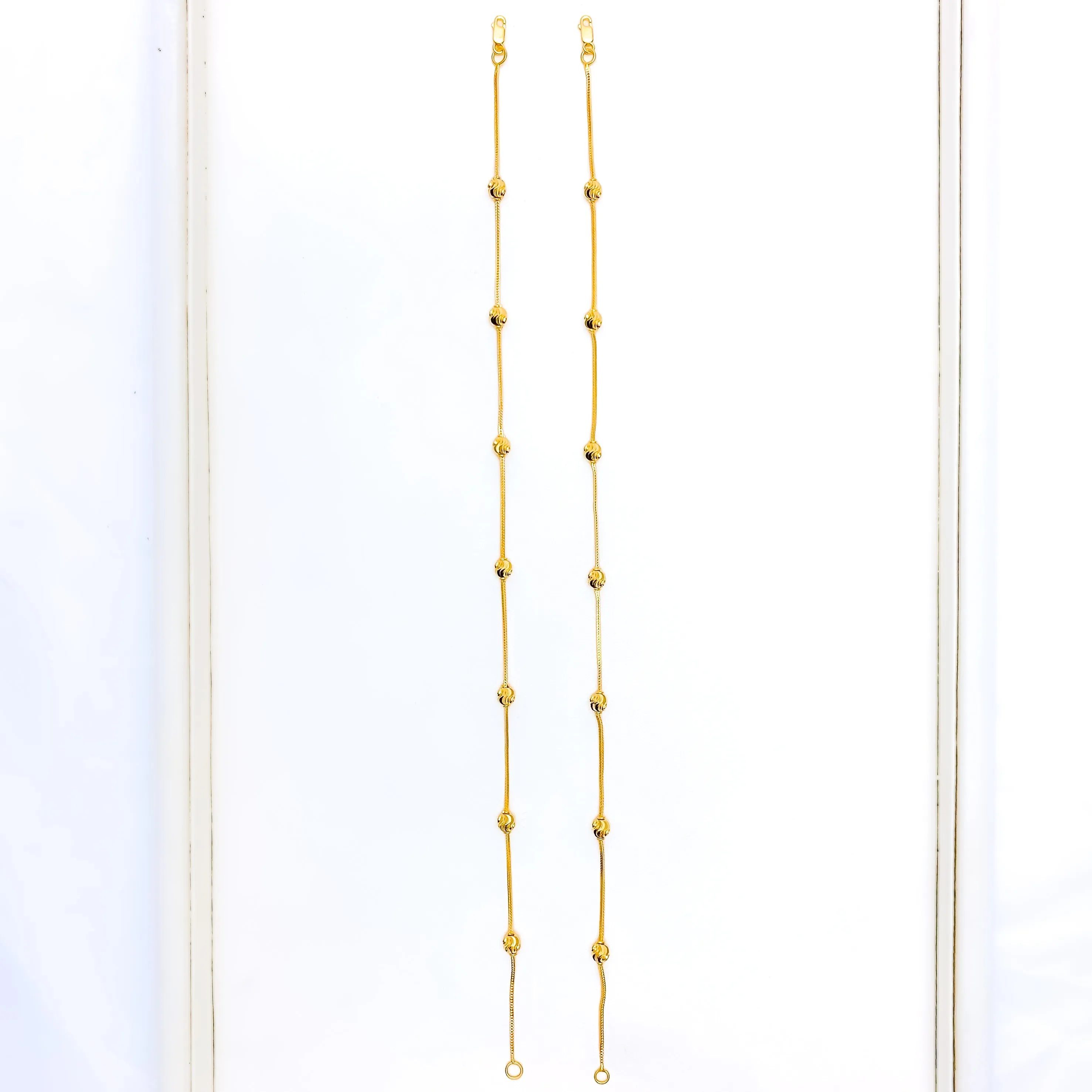 Interlinked Wavy Orb 21K Gold Anklet Pair