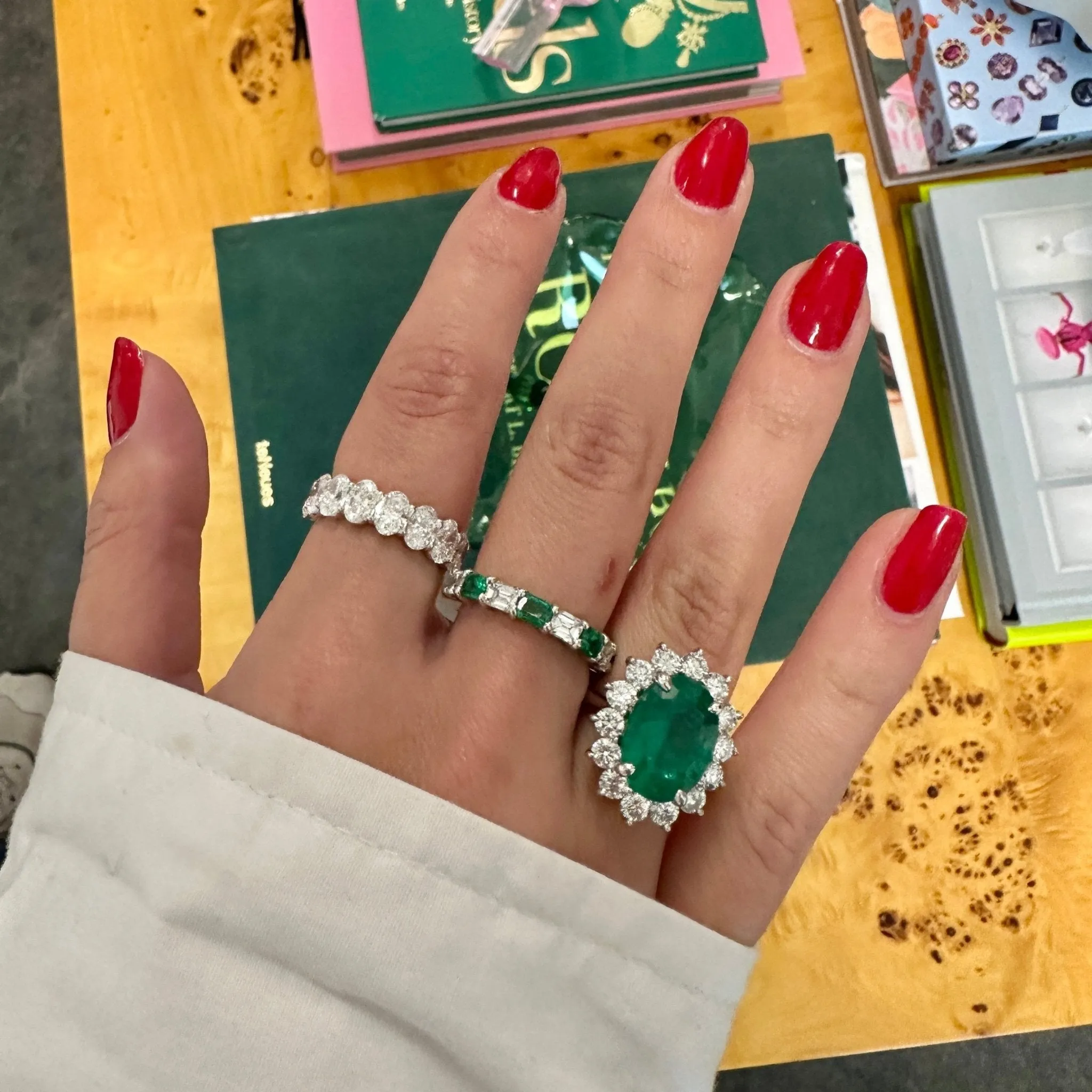 Oval Cut Emerald with Jumbo Round Diamond Halo