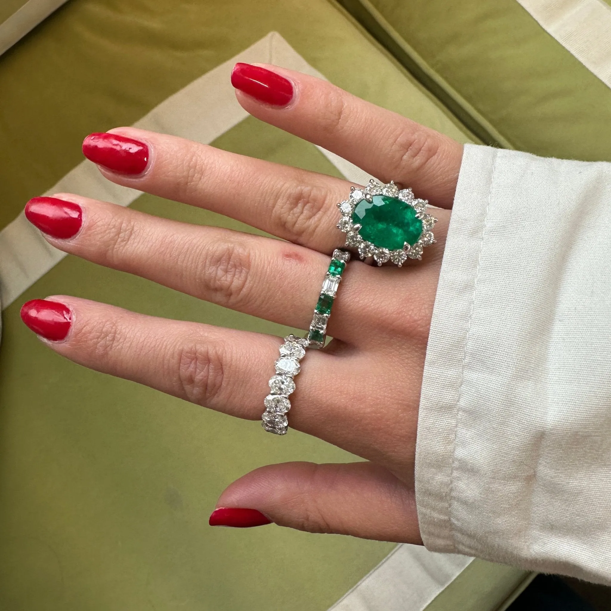 Oval Cut Emerald with Jumbo Round Diamond Halo