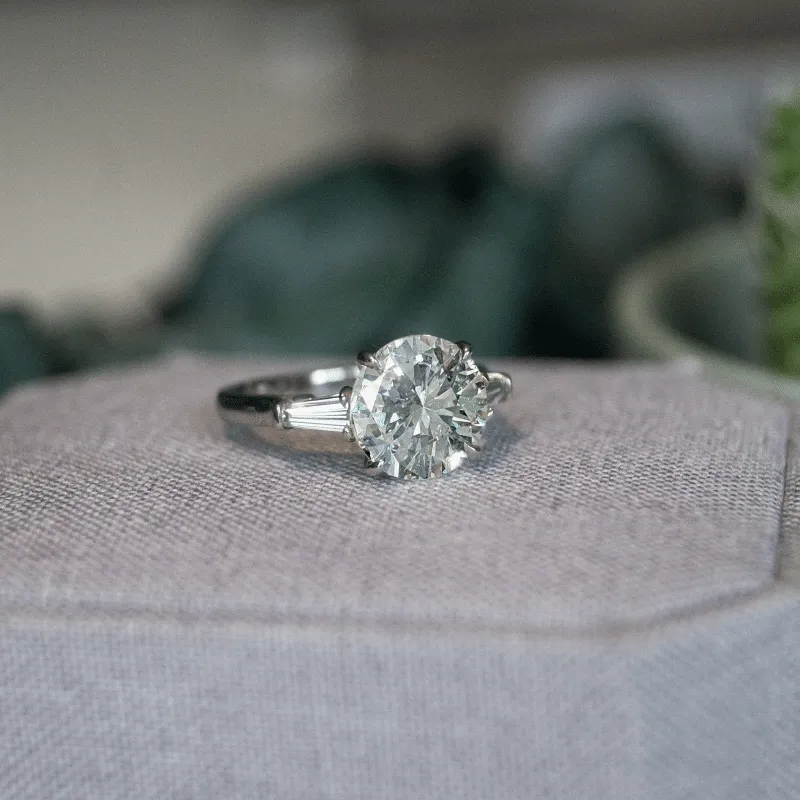 The Edelweiss Sunrise: Platinum 3.67 ct Round Brilliant and Tapered Baguette Diamond Ring