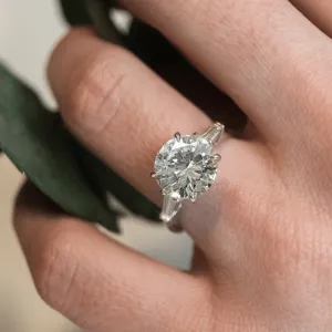 The Edelweiss Sunrise: Platinum 3.67 ct Round Brilliant and Tapered Baguette Diamond Ring