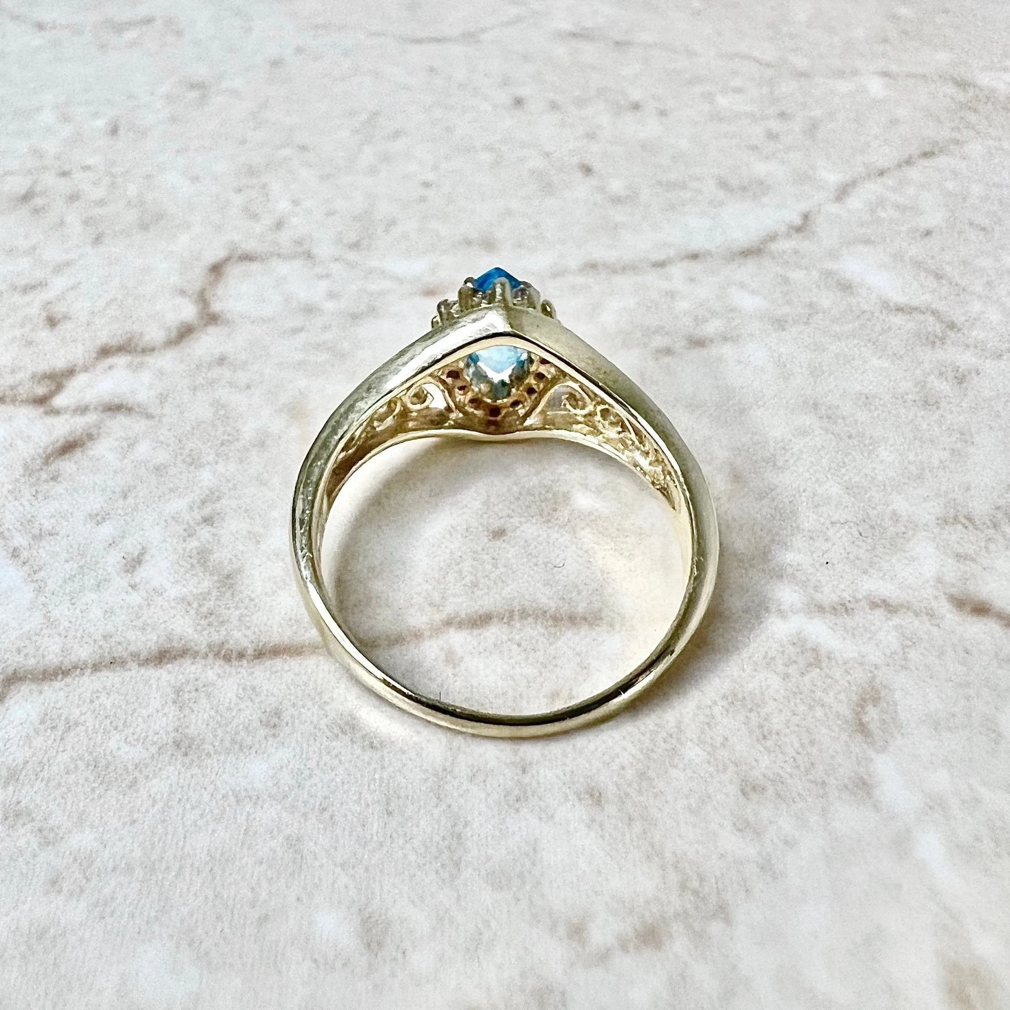 Vintage 14 Karat Yellow Gold Marquise Swiss Blue Topaz & Diamond Halo Ring