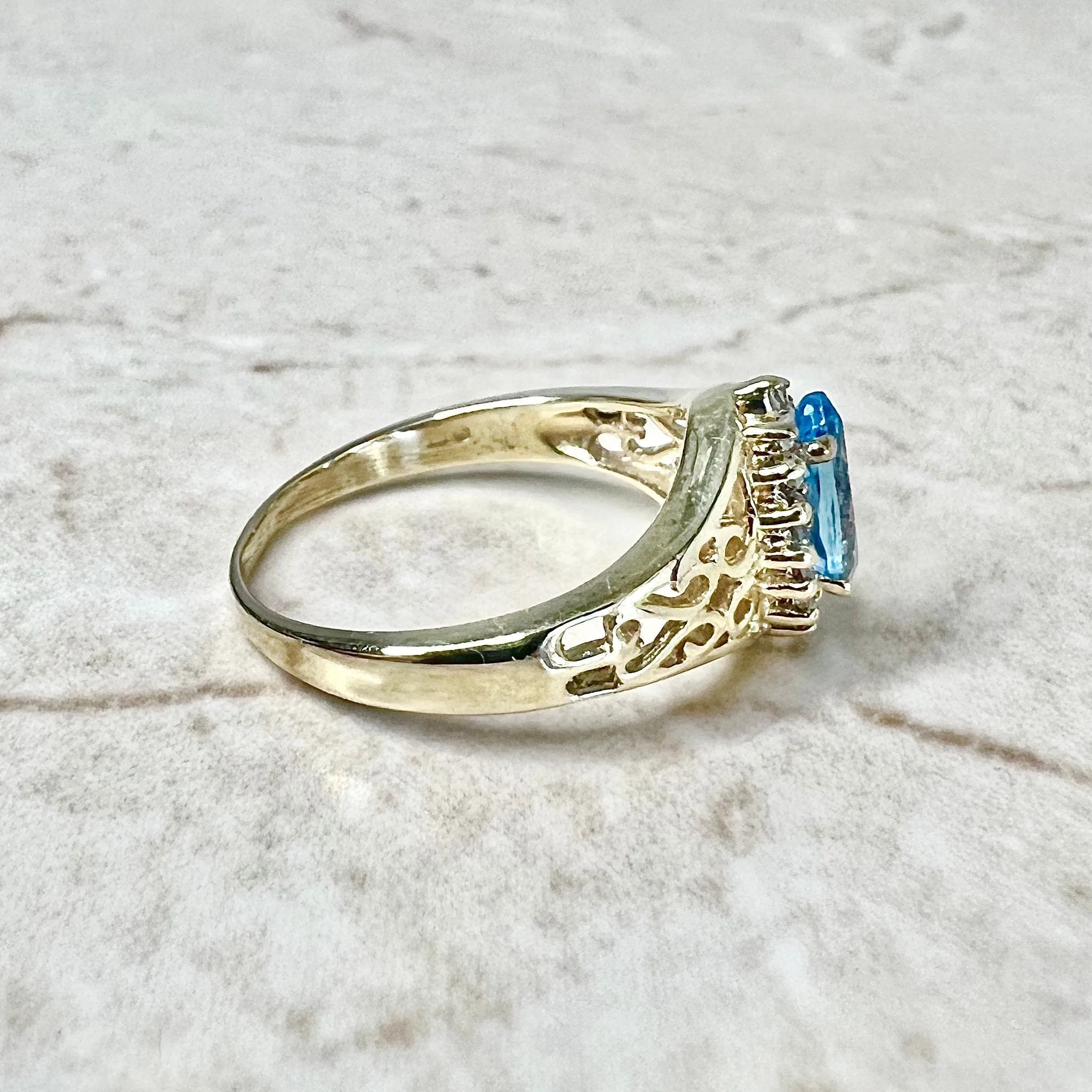Vintage 14 Karat Yellow Gold Marquise Swiss Blue Topaz & Diamond Halo Ring
