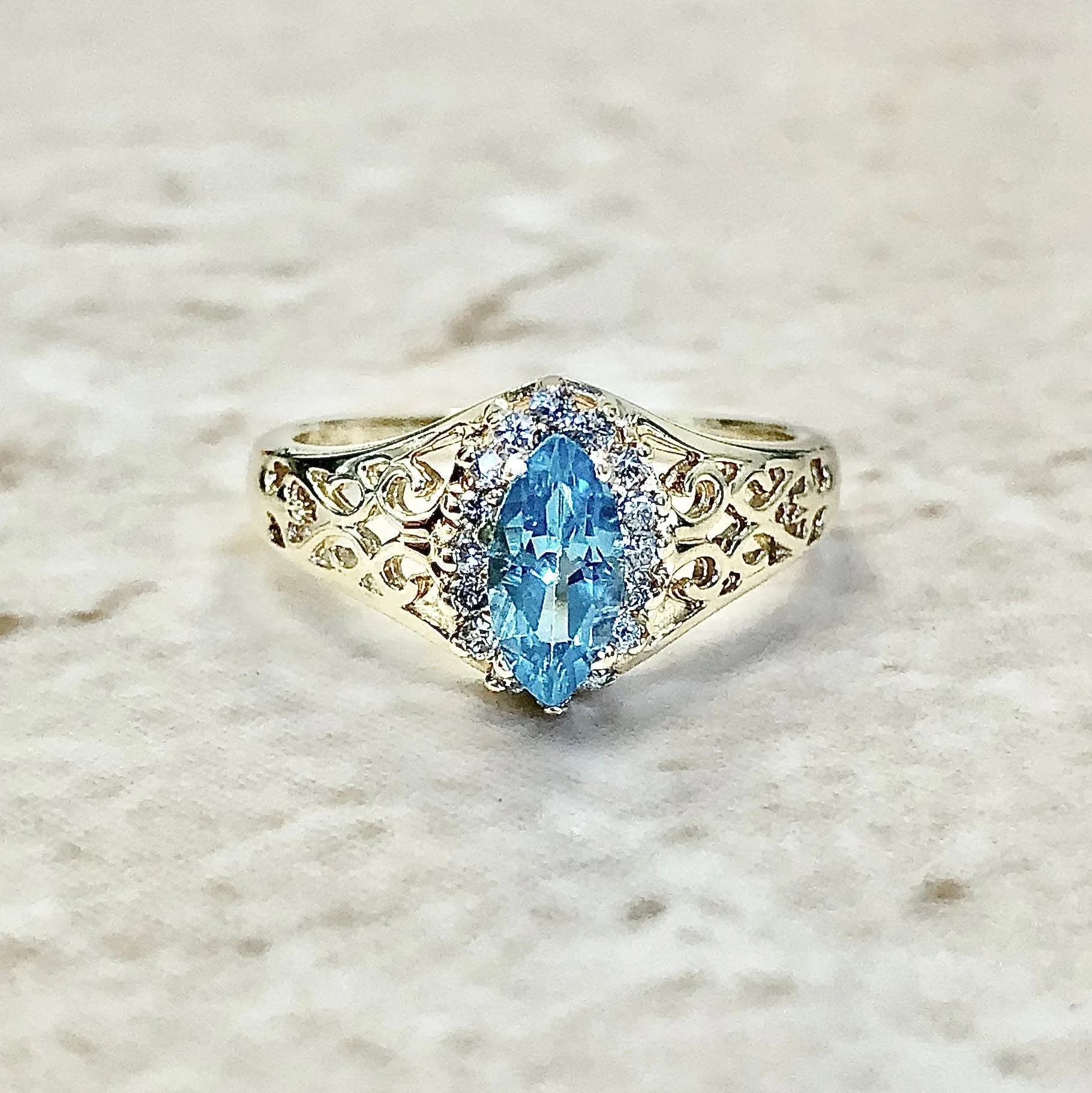 Vintage 14 Karat Yellow Gold Marquise Swiss Blue Topaz & Diamond Halo Ring