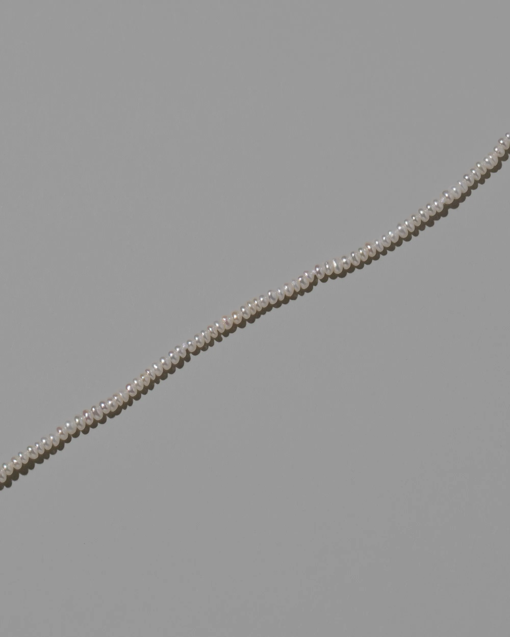 White Pebble Seed Pearl Anklet